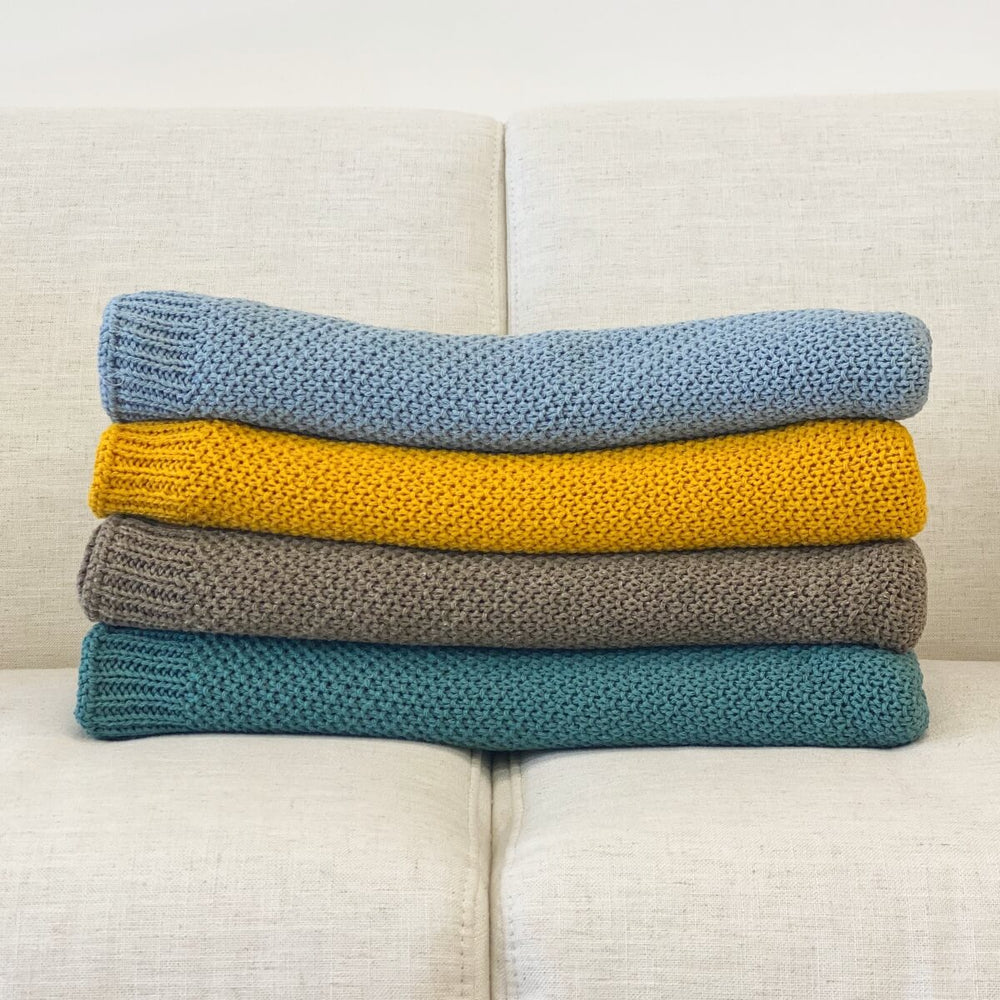Manta de tricot azul